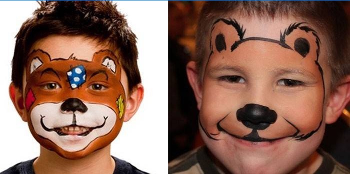 Fotografie de băieți cu ursul de pictură pe față